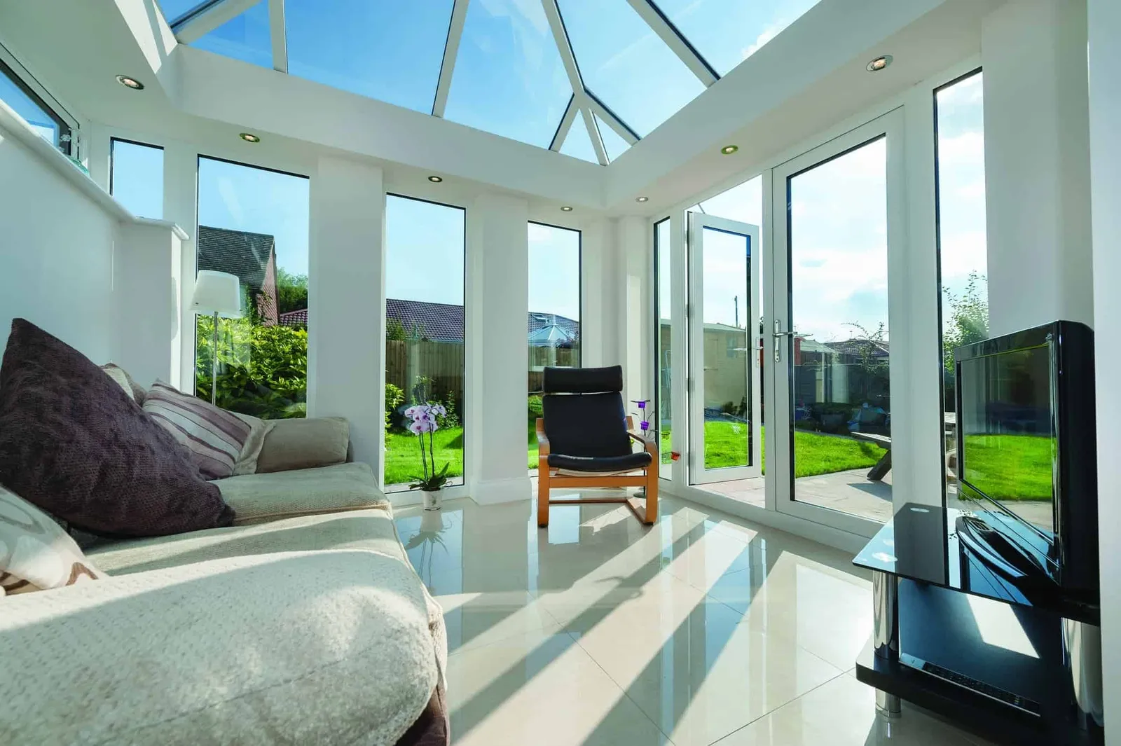 Large conservatory with a glass roof