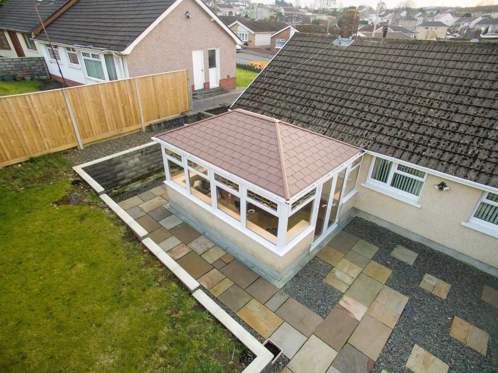 Square conservatory with solid Edwardian roof