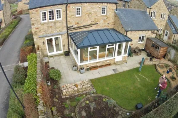 Conservatory exterior with solid roof
