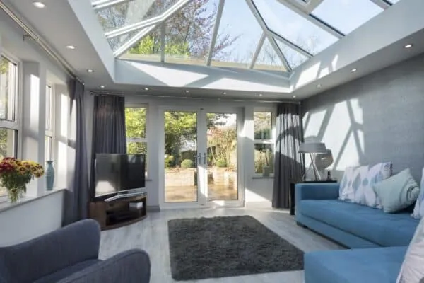 Living room home extension with a glass roof